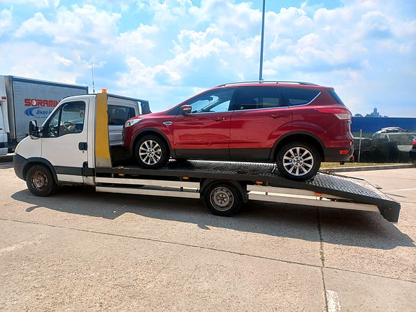 Tractări auto Slatina – transport Ford Kuga pe platformă